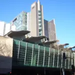 Exterior street-level view of the Australian Broadcasting Corporation headquarters building in Ultimo, Sydney.