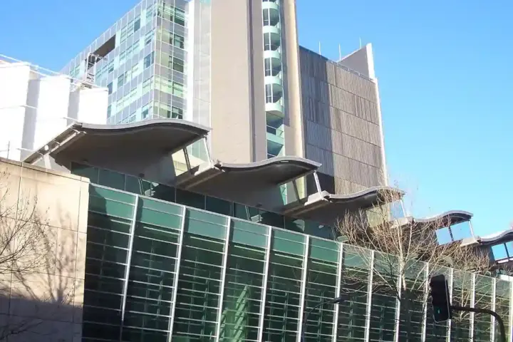 Exterior street-level view of the Australian Broadcasting Corporation headquarters building in Ultimo, Sydney.