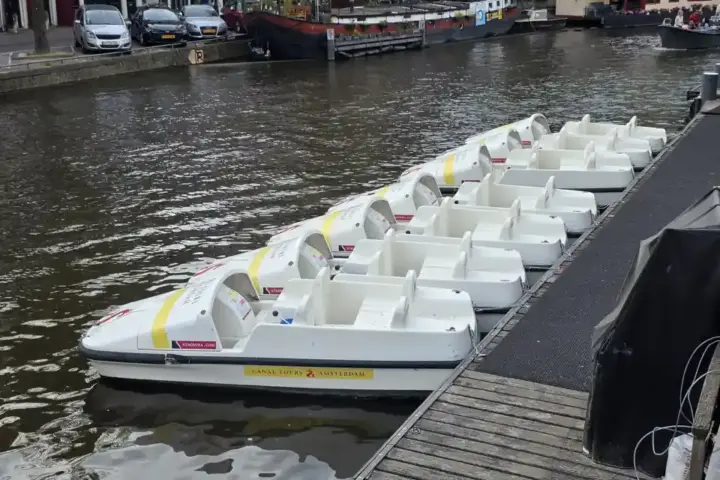 Boats on an Amsterdam canal, illustrating the city waterway context
