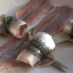 Sardines arranged on a serving plate