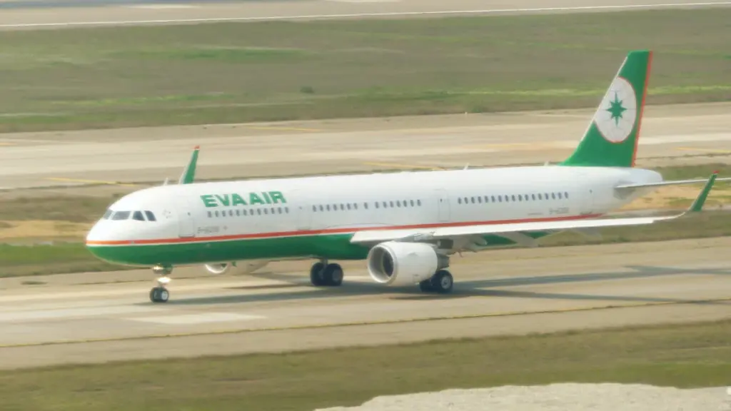 Commercial aircraft taxiing on the runway at Taoyuan International Airport in Taiwan
