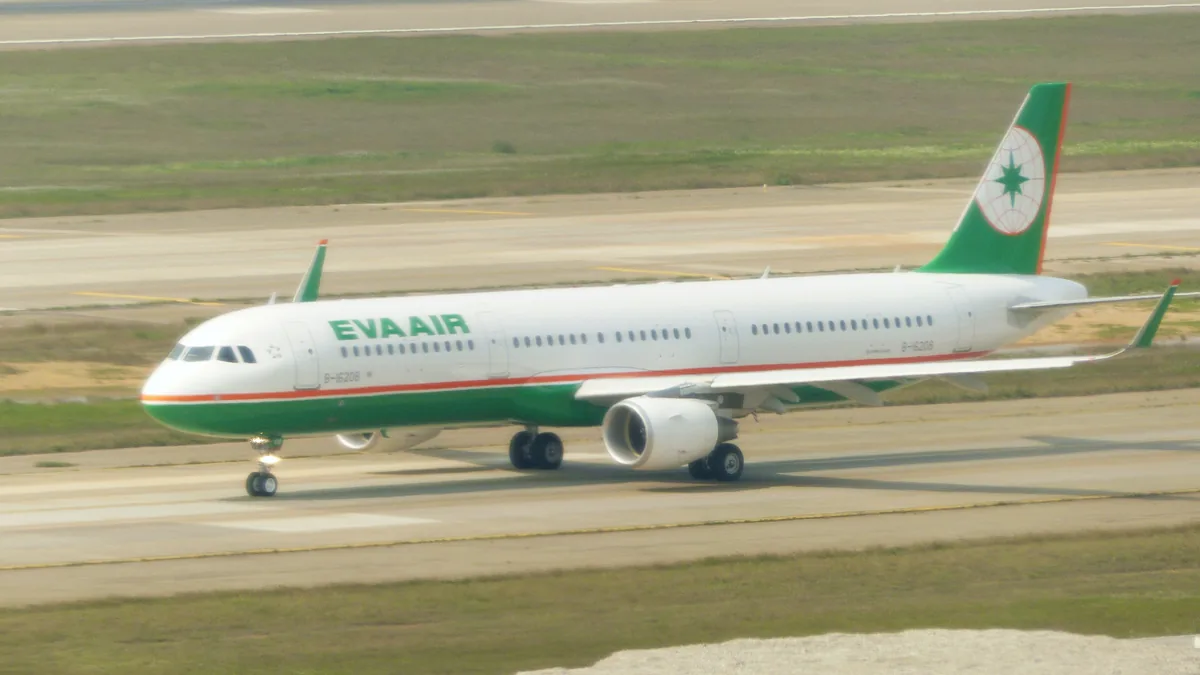 Commercial aircraft taxiing on the runway at Taoyuan International Airport in Taiwan