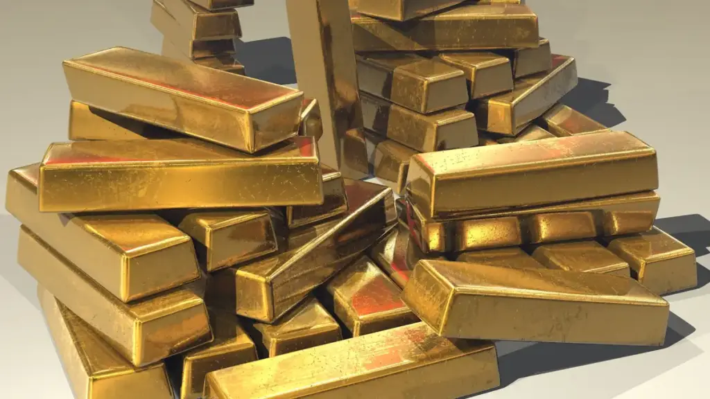 Close-up of stacked pure gold bullion bars