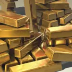 Close-up of stacked pure gold bullion bars