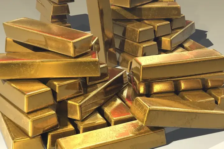 Close-up of stacked pure gold bullion bars