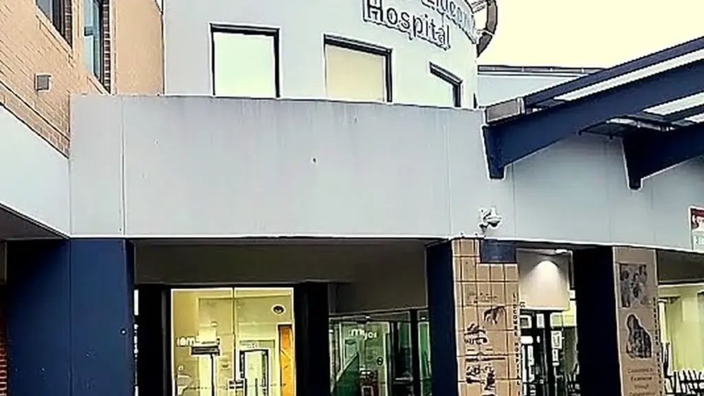 Exterior view of an Australian metropolitan public hospital brick and concrete building housing acute and inpatient wards.