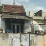Government ration shop in India with the storefront and surrounding area visible.