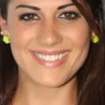 Close-up portrait of Australian former Olympic swimmer Stephanie Rice smiling at a Sydney public appearance.