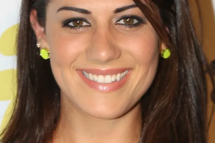 Close-up portrait of Australian former Olympic swimmer Stephanie Rice smiling at a Sydney public appearance.