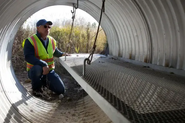 U.S. construction worker inspecting a worksite