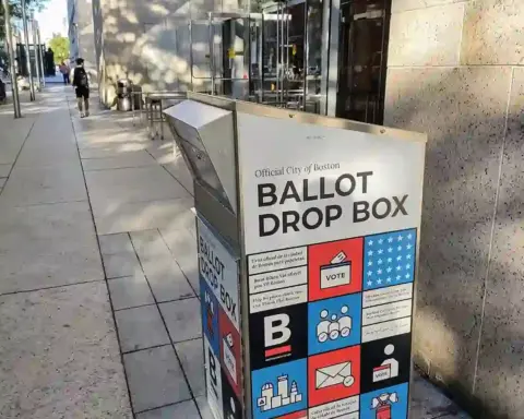 A secured ballot box situated inside an official election polling station.