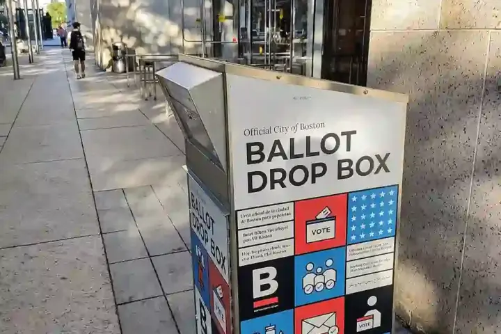 A secured ballot box situated inside an official election polling station.