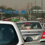Heavy vehicle congestion on a Delhi road, representing peak-hour traffic pressure around Barapullah Phase III.