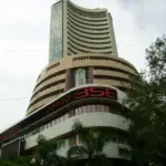 Upward angle of the iconic Phiroze Jeejeebhoy Towers housing the Bombay Stock Exchange in downtown Mumbai.