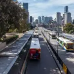 Buses queuing at the Cultural Centre busway station platform in South Brisbane, Australia.
