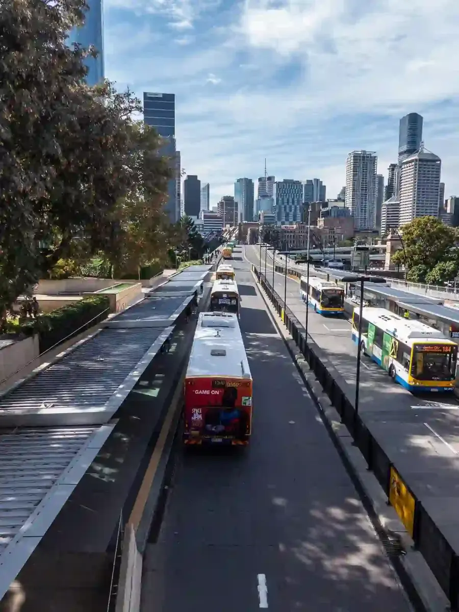 Buses queuing at the Cultural Centre busway station platform in South Brisbane, Australia.