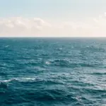 Ocean waves along a rocky coastline.