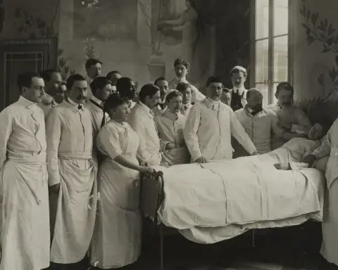 Medical staff consulting a female patient