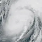 High-resolution meteorological satellite view showing the organized cloud canopy and eye of Category 3 Hurricane Isaias over the Gulf of Mexico.