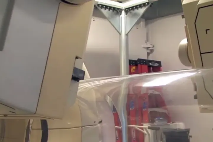 Cleanroom laboratory environment with high-precision imaging and molecular analysis equipment at the National Institutes of Health.