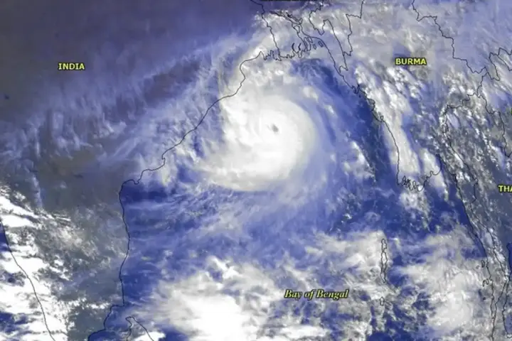 A tropical cyclone seen as a spiral cloud system from a weather satellite