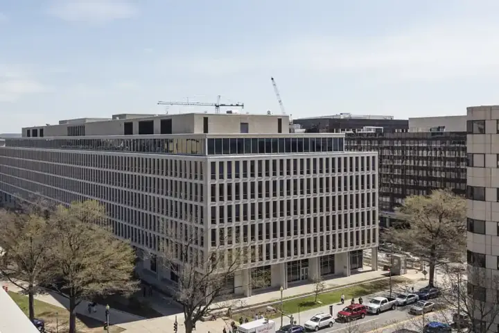 Exterior of the Lyndon Baines Johnson Department of Education building, a large Brutalist government structure in Washington D.C.
