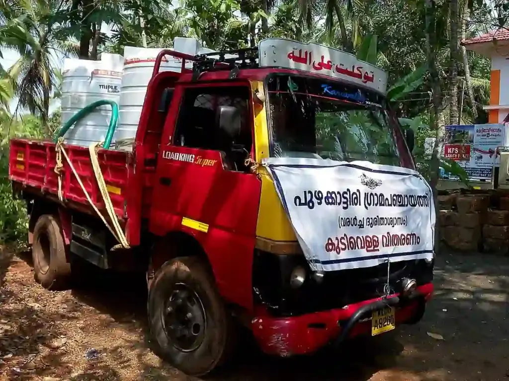 Drinking-water distribution during drought conditions in India.