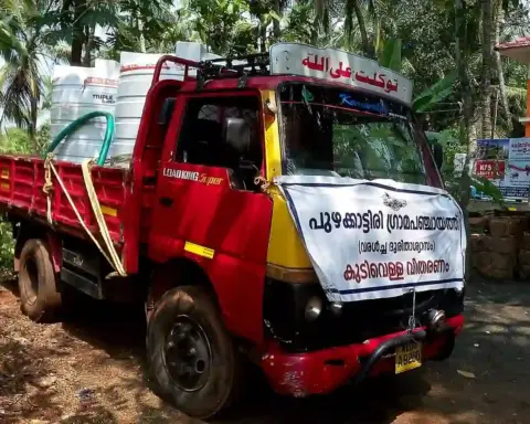 Drinking-water distribution during drought conditions in India.