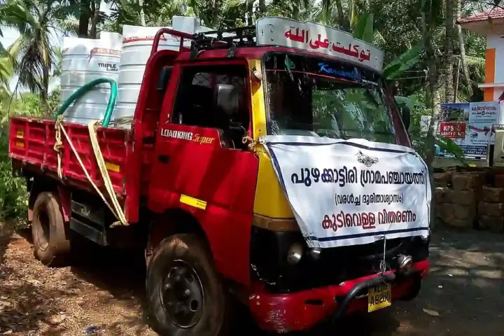 Drinking-water distribution during drought conditions in India.