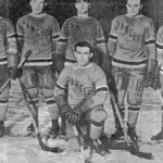 Historic black and white photograph of New York Rangers ice hockey players in team jerseys on the rink