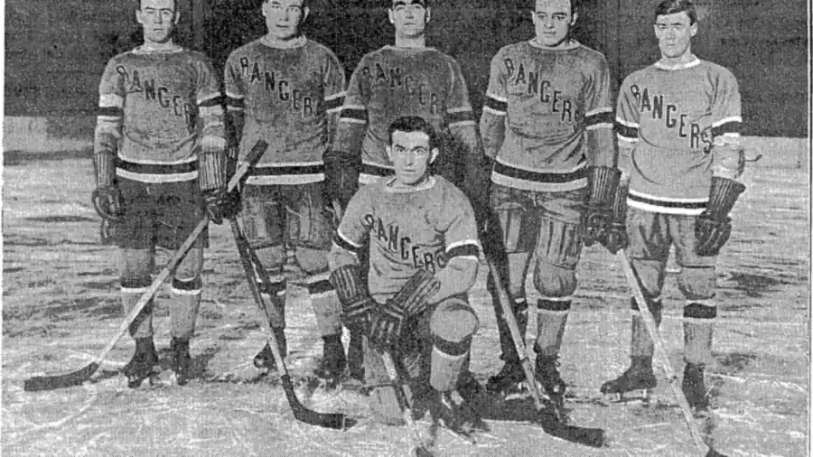 Historic black and white photograph of New York Rangers ice hockey players in team jerseys on the rink