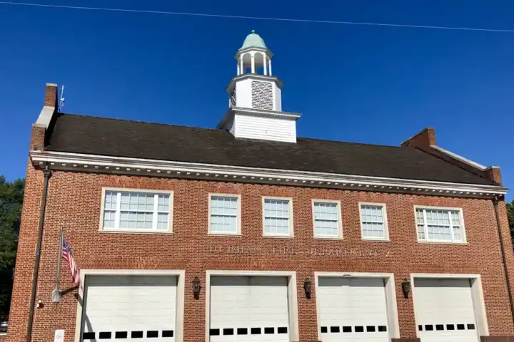 Exterior brick facade of a municipal Durham Fire Department station in North Carolina.