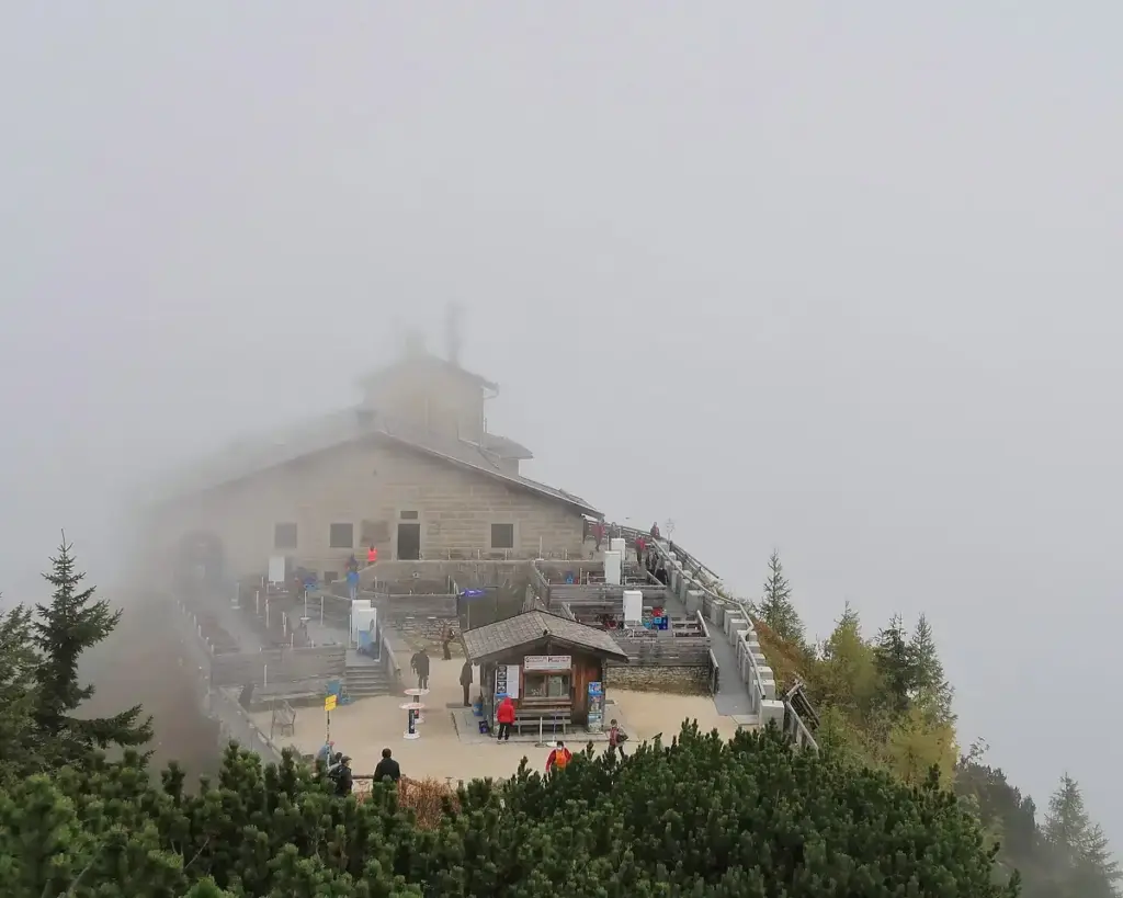 Stone building of the Kehlsteinhaus sitting on a steep alpine ridge in the Bavarian Alps.