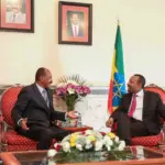 Ethiopian Prime Minister Abiy Ahmed and Eritrean President Isaias Afwerki speaking together in Eritrea in 2019, representing diplomatic relations between the two Horn of Africa nations