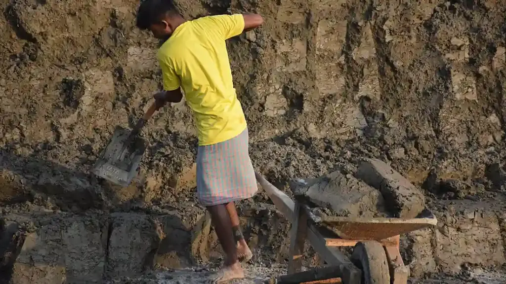 Workers at a brick kiln