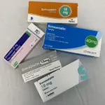 Blister packs and bottles of simvastatin cholesterol-lowering tablets.