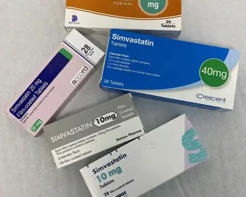 Blister packs and bottles of simvastatin cholesterol-lowering tablets.