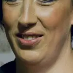 Portrait photograph of British comedian Miranda Hart smiling at a public event.