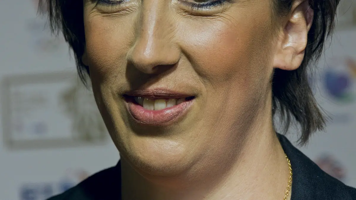 Portrait photograph of British comedian Miranda Hart smiling at a public event.