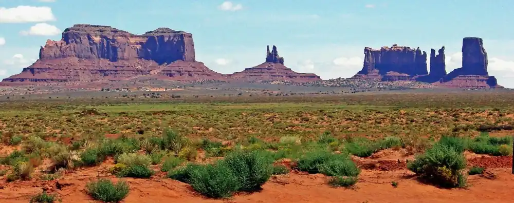 Sandstone formations and desert landscape in Monument Valley on the Navajo Nation.