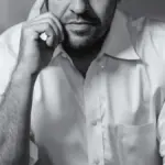 Karl Deisseroth in a black-and-white portrait at Stanford University.