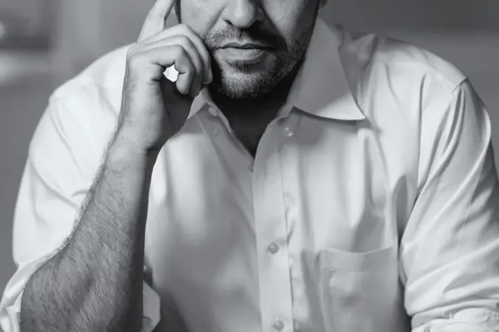 Karl Deisseroth in a black-and-white portrait at Stanford University.