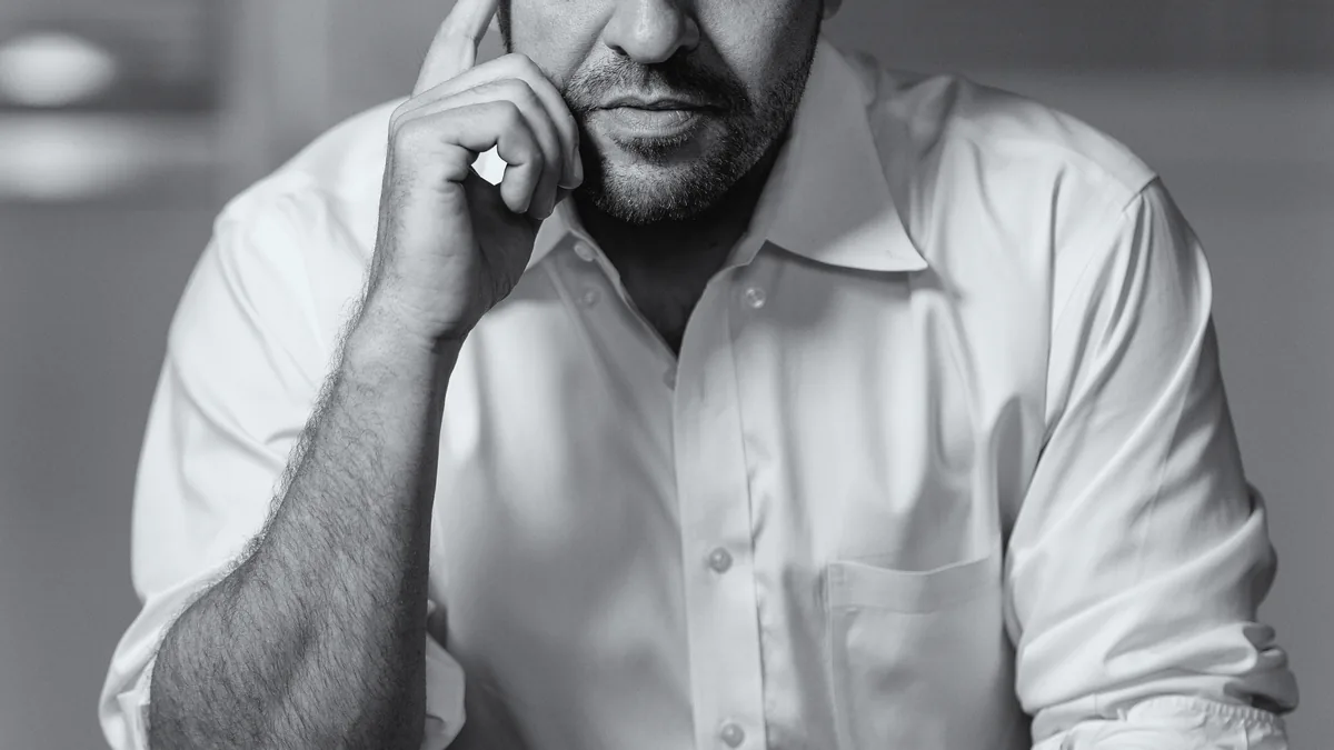 Karl Deisseroth in a black-and-white portrait at Stanford University.