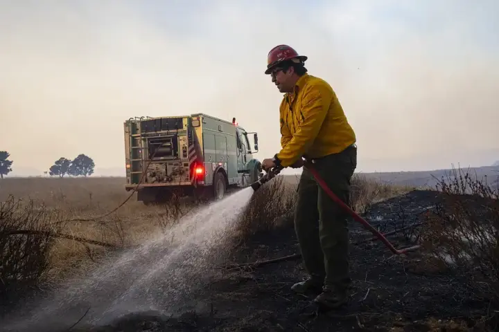 USFS firefighters work at a California wildfire in an illustrative archival image