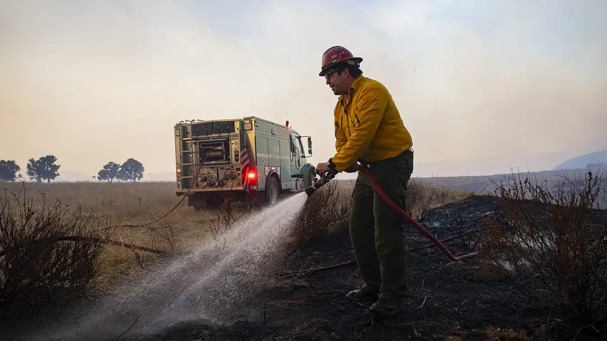 USFS firefighters work at a California wildfire in an illustrative archival image