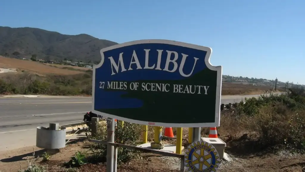 Coastal roadway and dry mountain brush along Pacific Coast Highway in Malibu, Southern California.