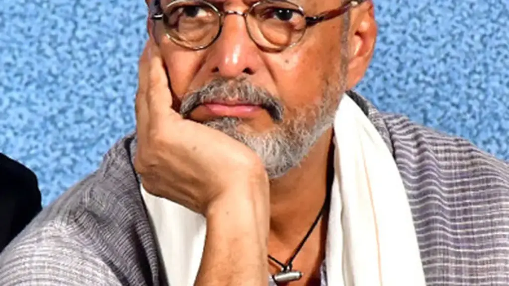 Photograph of veteran Indian actor and Naam Foundation co-founder Nana Patekar looking forward in a traditional white kurta during a public address.
