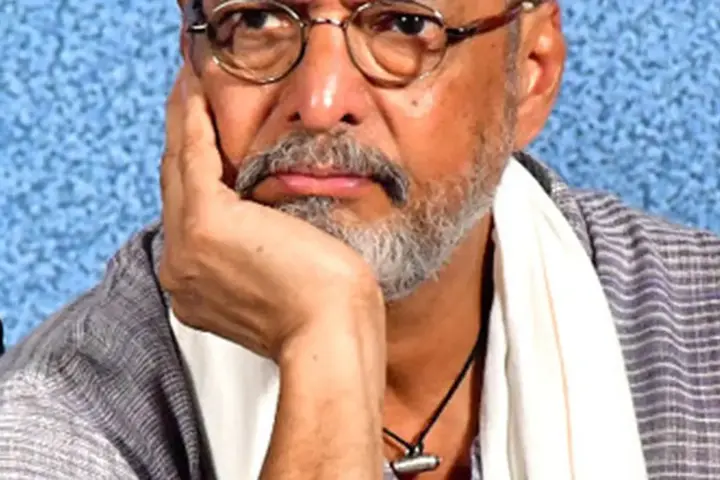 Photograph of veteran Indian actor and Naam Foundation co-founder Nana Patekar looking forward in a traditional white kurta during a public address.