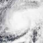 High-resolution visible satellite capture of a powerful tropical cyclone spinning over the eastern Pacific Ocean off Mexico.