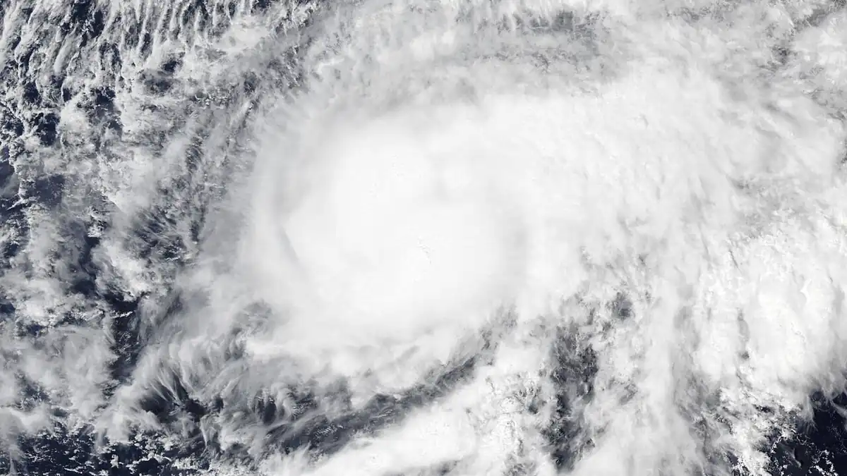 High-resolution visible satellite capture of a powerful tropical cyclone spinning over the eastern Pacific Ocean off Mexico.